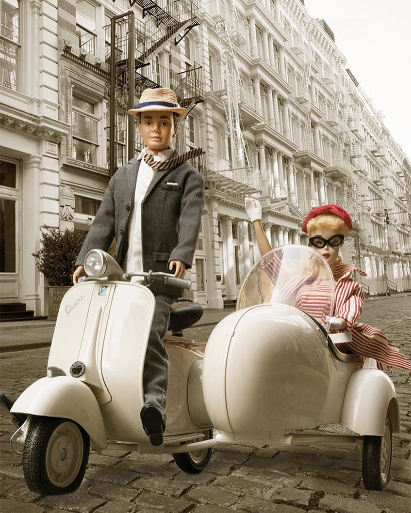 Barbies in mortorcycle on street