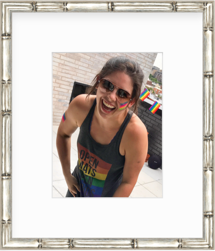 Woman in pride tanktop in a silver frame