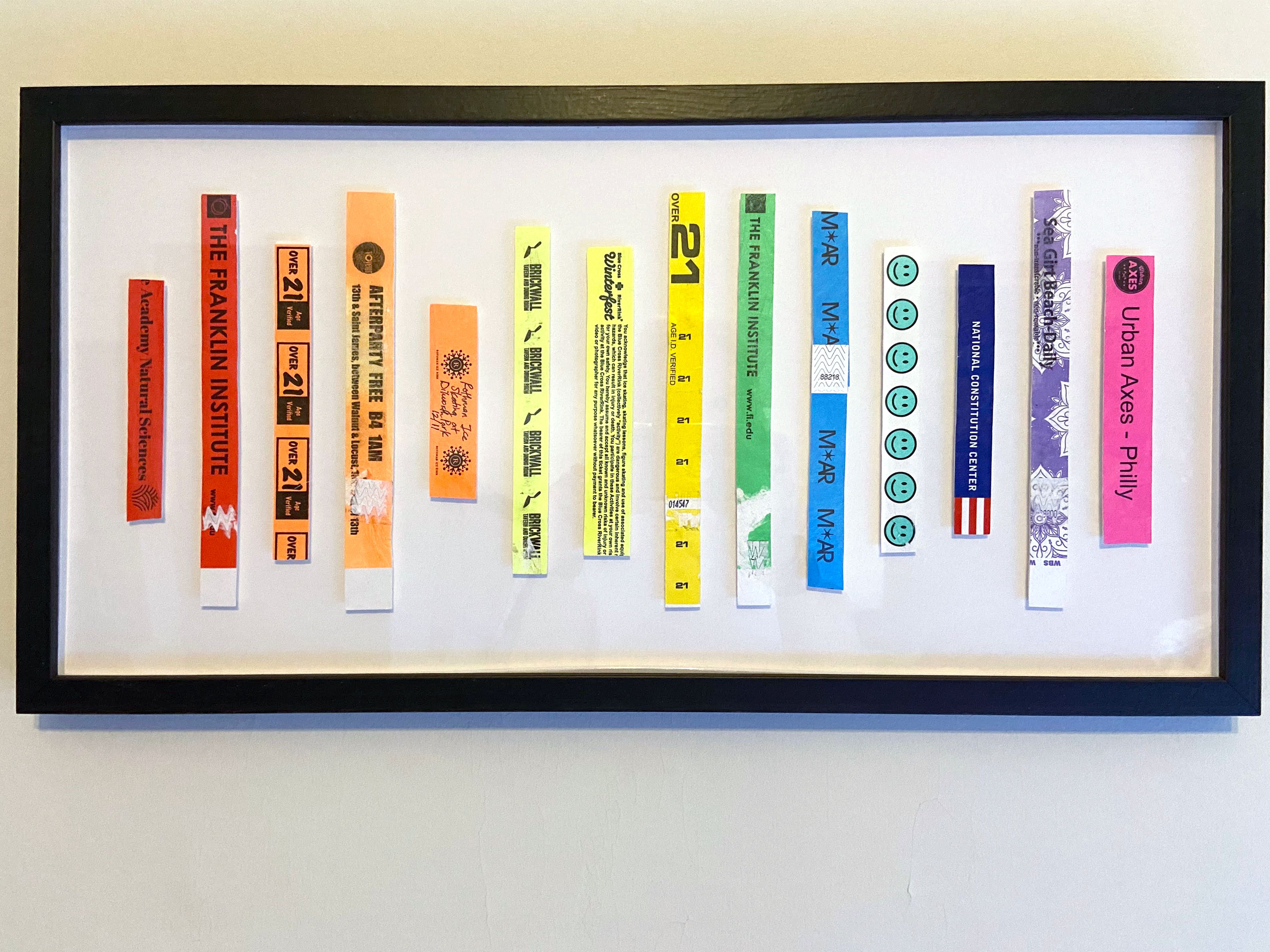 Framed event bracelets in rainbow layout.
