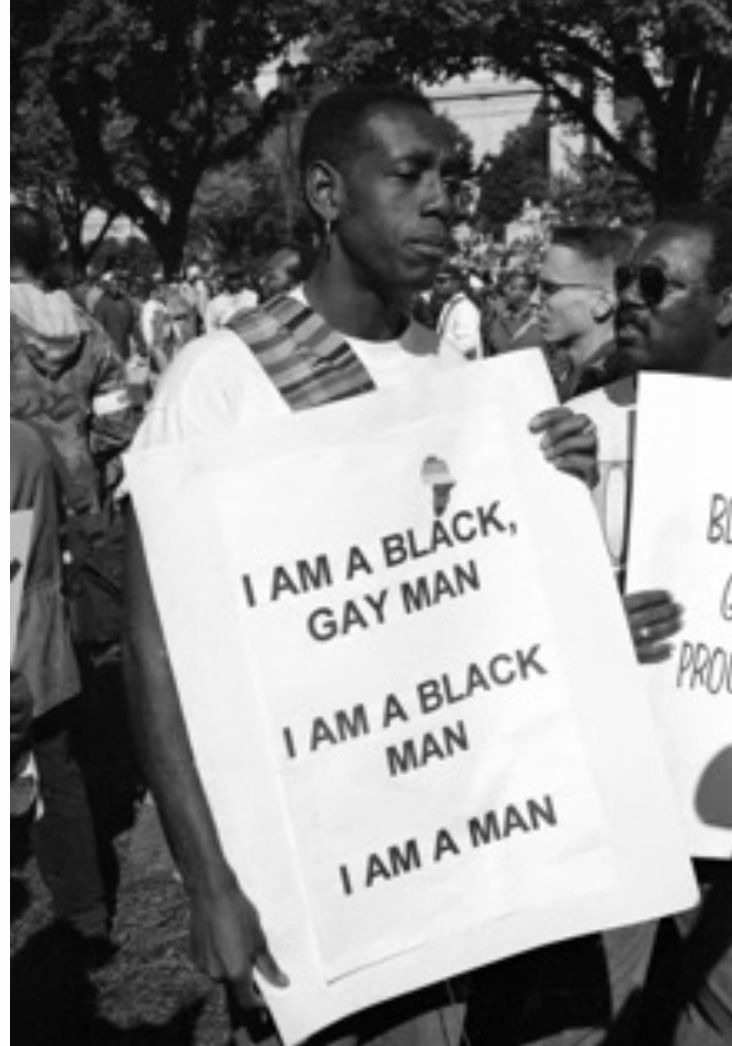 Man at Million Man March holding sign